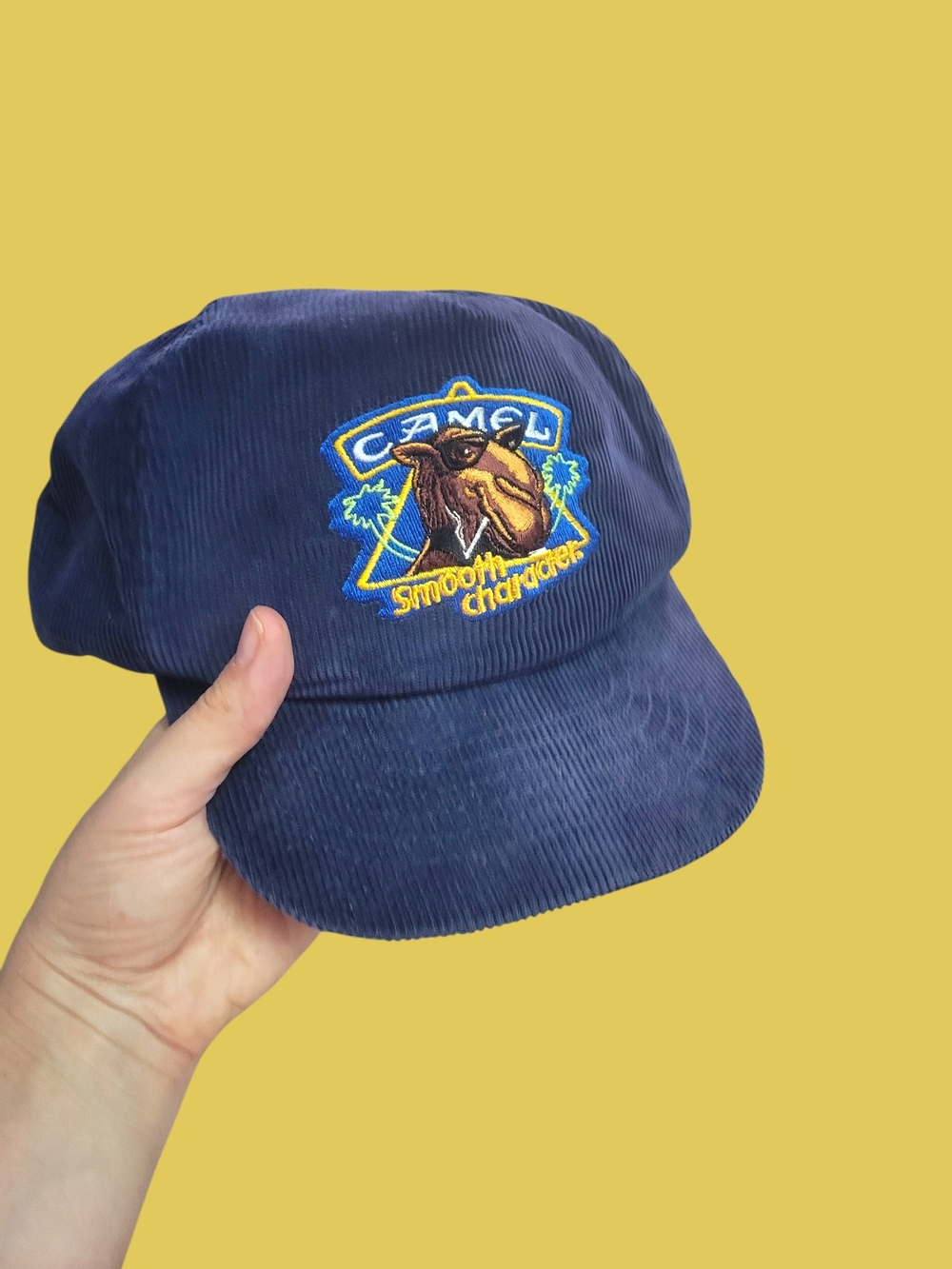 Camel Embroidered Navy Corduroy Cap - 'Smooth Characters'